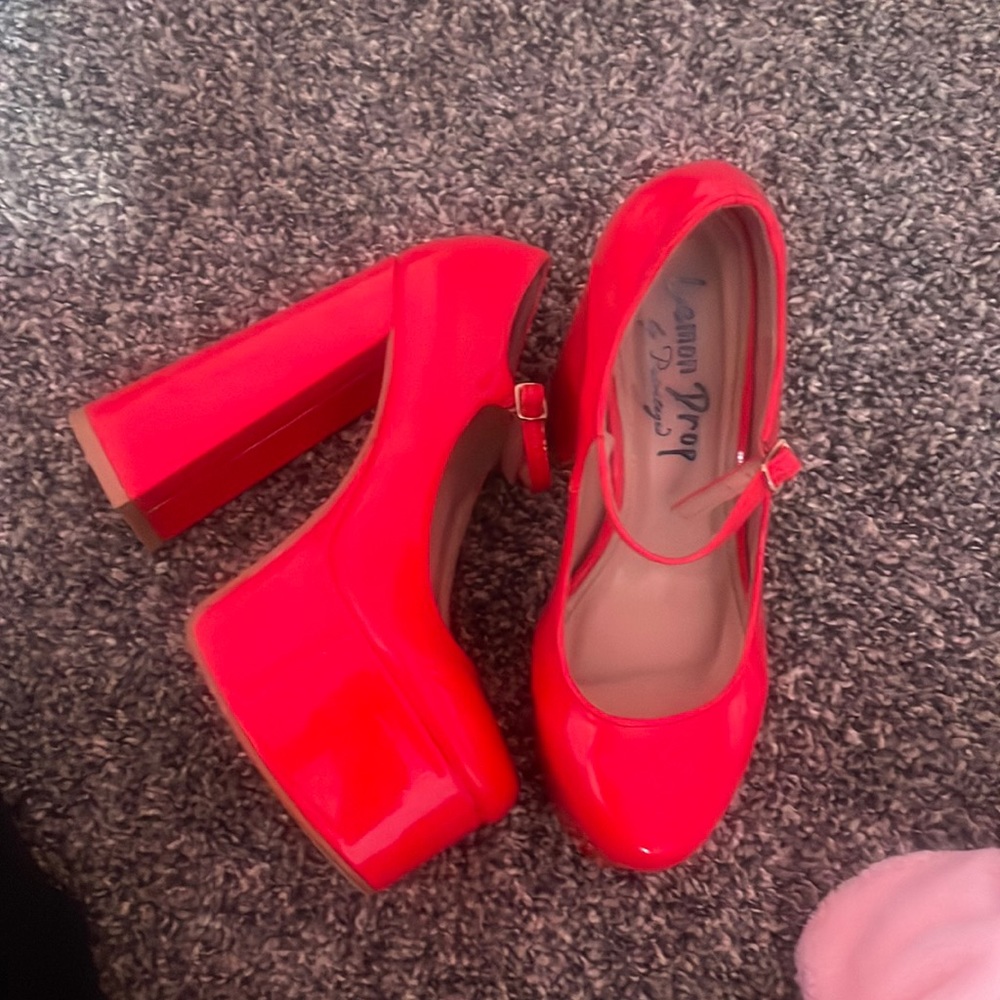 Red patent mary jane platforms